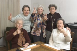 senior women at the game table